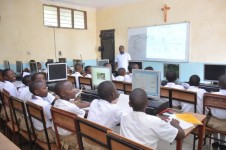  Students in the computer lab with their teacher during the lesson 